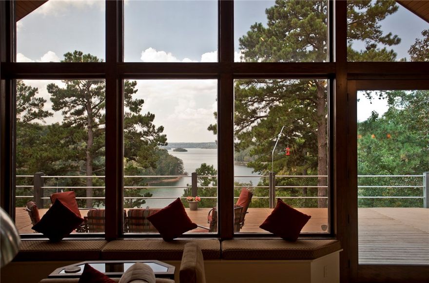 Stunning!! This one-of-a-kind lake front property truly is stunning. The home sits on 8.18 lake front acres and offers a million dollar view of Beaver Lake from the living room and master bedroom. With over 6,000 sq ft there is plenty of room for everyone. The home features two levels with three bedrooms, five full baths, home office and two living areas. The home has an automatic back-up generator. Private, two stall boat dock. There is a separate Guest house as well.