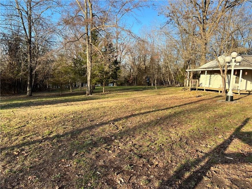 .85 acre lot with seasonal lake view. Enjoy the scenic drive out Highway 12 East, only 19 miles from downtown Rogers. Owner has hunting cabin (can be removed) and blind on property. This lot is ready for you whether you're looking to build or a recreational get-a-way!