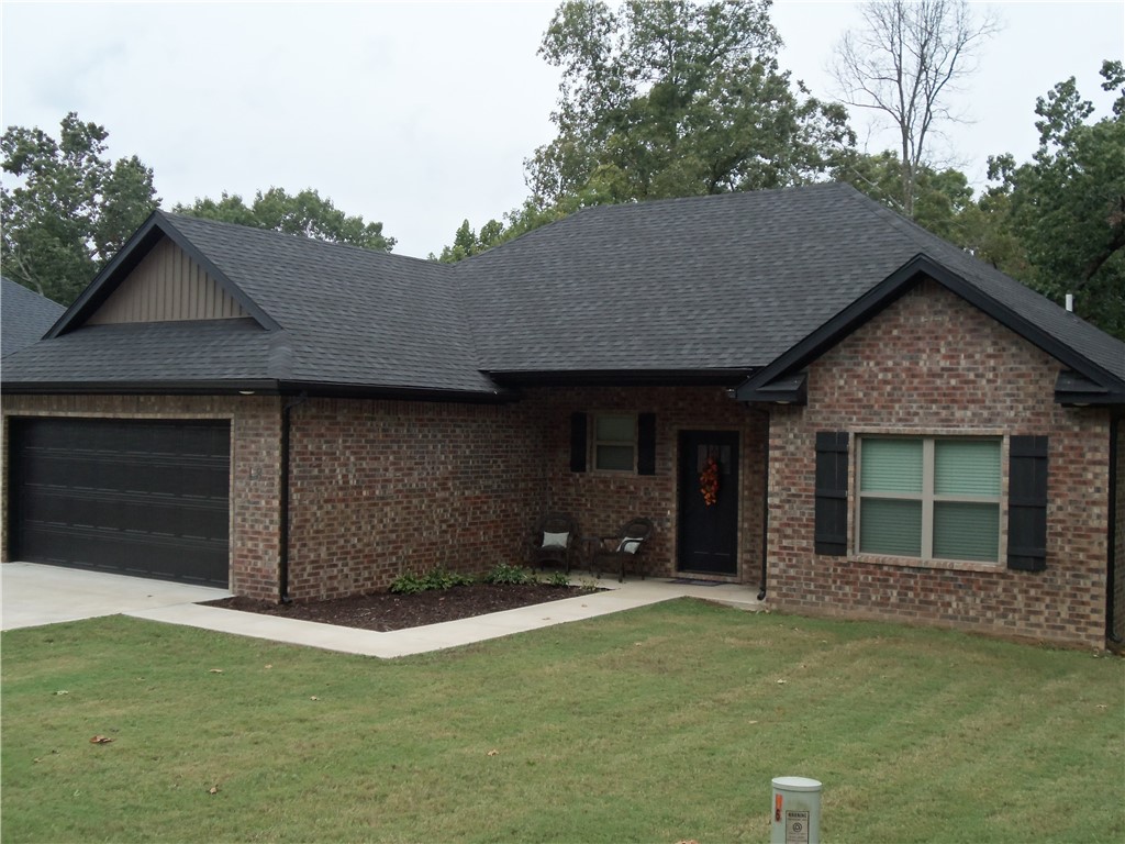 Like new! All brick, one owner, well-kept home. Two bedroom plus a bonus flex/office room. Less than 3 easy miles to the Bella Vista Bypass. Enjoy the trees/green space from the back deck. Open concept, split floor plan, and a cozy fireplace. Granite counters, under cabinet lighting, pantry & ALL kitchen appliances convey. Primary bath has a double vanity and two walk-in closets. Less than a mile to Highlands Golf & Pub, 1 mile to Branchwood Nature Trail - hiking, biking, pet friendly, frisbee golf, and playground. Close to Bella Vista's largest lake: Loch Lomond. Other amenities in the Bella Vista community include 6 golf courses and a practice facility, 7 private/stocked lakes for fishing, boating and outdoor recreation, swimming pools, parks, tennis, dog park, gun range, fitness facilities, restaurants, and over 40 miles of scenic trails for walking, hiking and biking. Plus this house is USDA Loan eligible - talk to your lender about getting into this home with zero down payment!