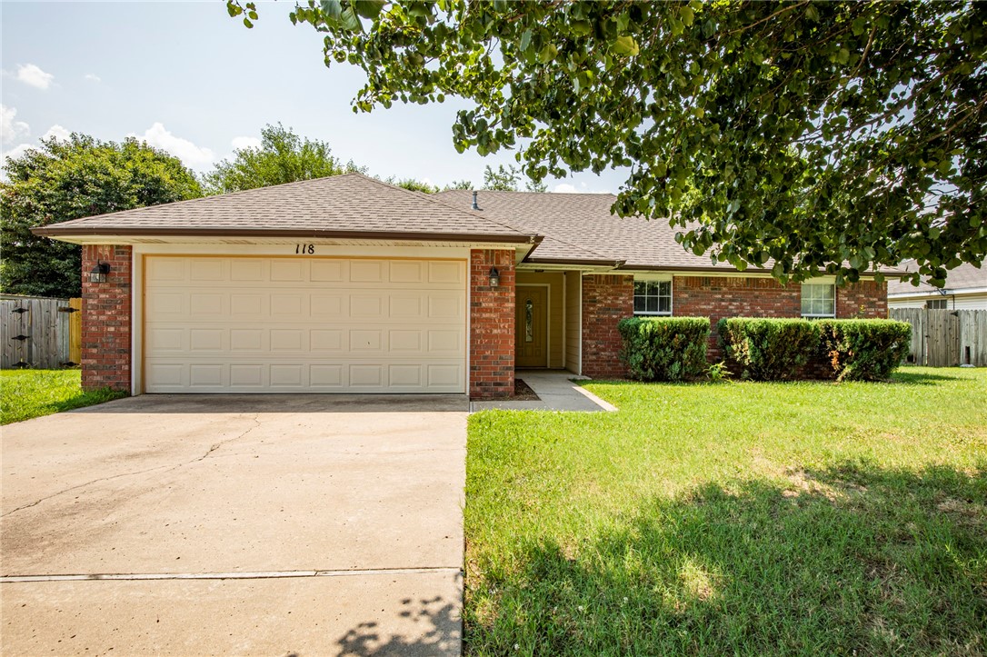 Great home in Lowell, just minutes from I-49. This 3 Bedroom 2 bath home features vaulted ceiling in living room, granite counters, large island and pantry in kitchen. Tile thru main area of home and new carpet in bedrooms. Master has walk in closet. Large covered patio and fenced yard.