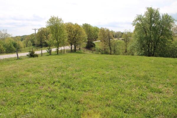 Home Site - 1.5 acres in Bergman Schools, nice view, paved road frontage, public water and natural gas should be available, buyer to verify availability and cost to access all utilities. See Aerial Sketch and Survey plat in Documents.
