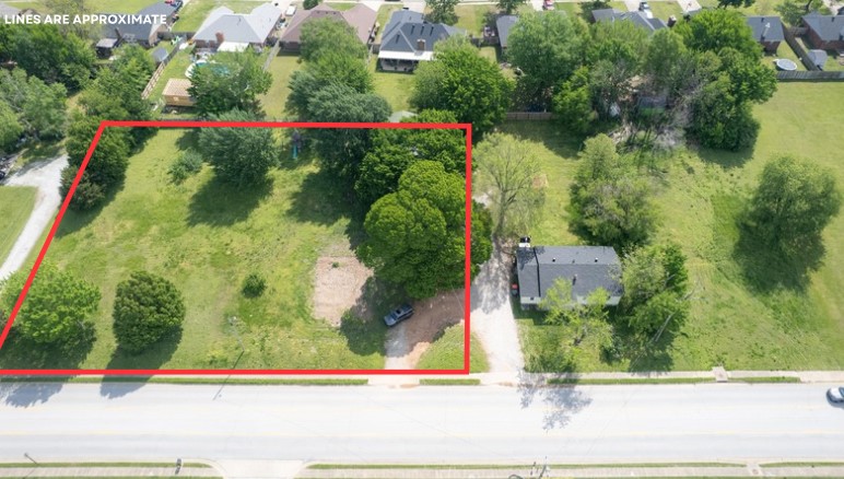Exceptional opportunity for development in highly desirable location. The property is ideally situated near established office parks, Northwest Arkansas Children's Hospital, Arvest Ballpark, Restaurants & more. Convenient Access to I-49 and centrally located with ease of access to both Bentonville and Fayetteville. The land is level and fully serviced with all utilities in place. Currently zoned for multi-family use allows for up to 8 units per acre under existing zoning regulations. See additional listing purchase options - 2417 48th St, MLS #1308410 and 2377 & 2417 48th St together, mls #1308414.