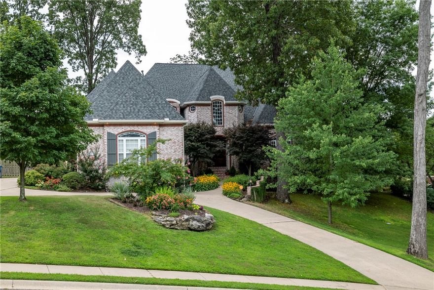 Gorgeous home in sought after Hanover Subdivision! Beautifully custom-designed with built-ins throughout, lots of natural light, designer touches, & an open & spacious floorplan. Hearth room & gourmet kitchen calls for some great entertaining, 2 story living room, 3 fireplaces, & an upstairs sitting room/outdoor balcony. Master bedroom & private office on main level.  3 bedrooms/2 bath upstairs with one of those able to be used as a private, 2nd master. Upstairs has an extra room with 700 sq feet ready (AC/Heat) to finish as you’d like! Mature, landscaped yard with lots of shade & space to enjoy a peaceful night on the back deck or patio or to roast marshmallows by the fire. Prime location 3 min to I-49 & just min from amenities. Located less than 2 blocks from the Slaughter-Pen Trailhead and dog park and connects easily to multiple walking/bike paths. Just 5 min to Downtown, Crystal Bridges, and the Walmart Home Office. Beautiful home in this established neighborhood that won’t last long! Come fall in love!