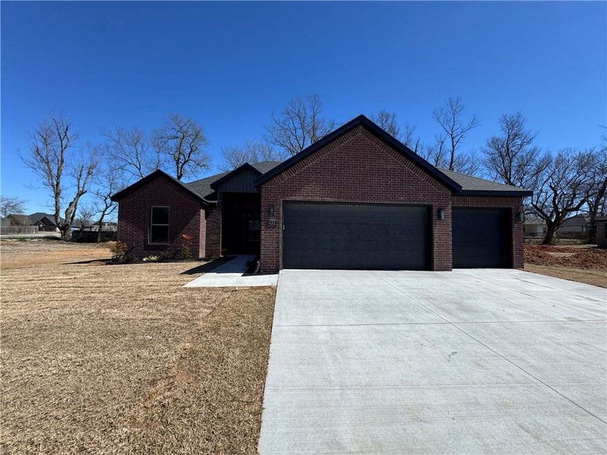 New year, new home! Welcome to this beautiful new construction home in Siloam Springs with a January 30th completion date! This thoughtfully designed 4-bed, 2-bath home offers 2,068 square feet of modern living space with quality finishes throughout. The exterior features classic brick construction, a 3 car garage, & an inviting curb appeal, while inside you’ll find luxury vinyl plank flooring, an open & functional layout, & abundant natural light. The kitchen is equipped with granite countertops, energy star appliances, eat-in kitchen space, & ample cabinetry. Enjoy outdoor living on the patio. Don’t miss the opportunity to own this move-in-ready new construction home in a growing Siloam Springs neighborhood!
