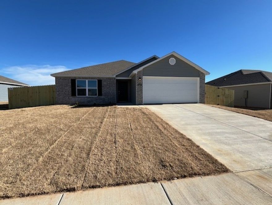 Pea Ridge 3 bedroom, 2 bath 2 car garage never lived in and is available now! Nice sized living room, open floor plan. Kitchen bar with energy efficient appliances and a pantry. Refrigerator is provided. Back yard is fenced in and has a covered patio area. Convenient to town and schools.