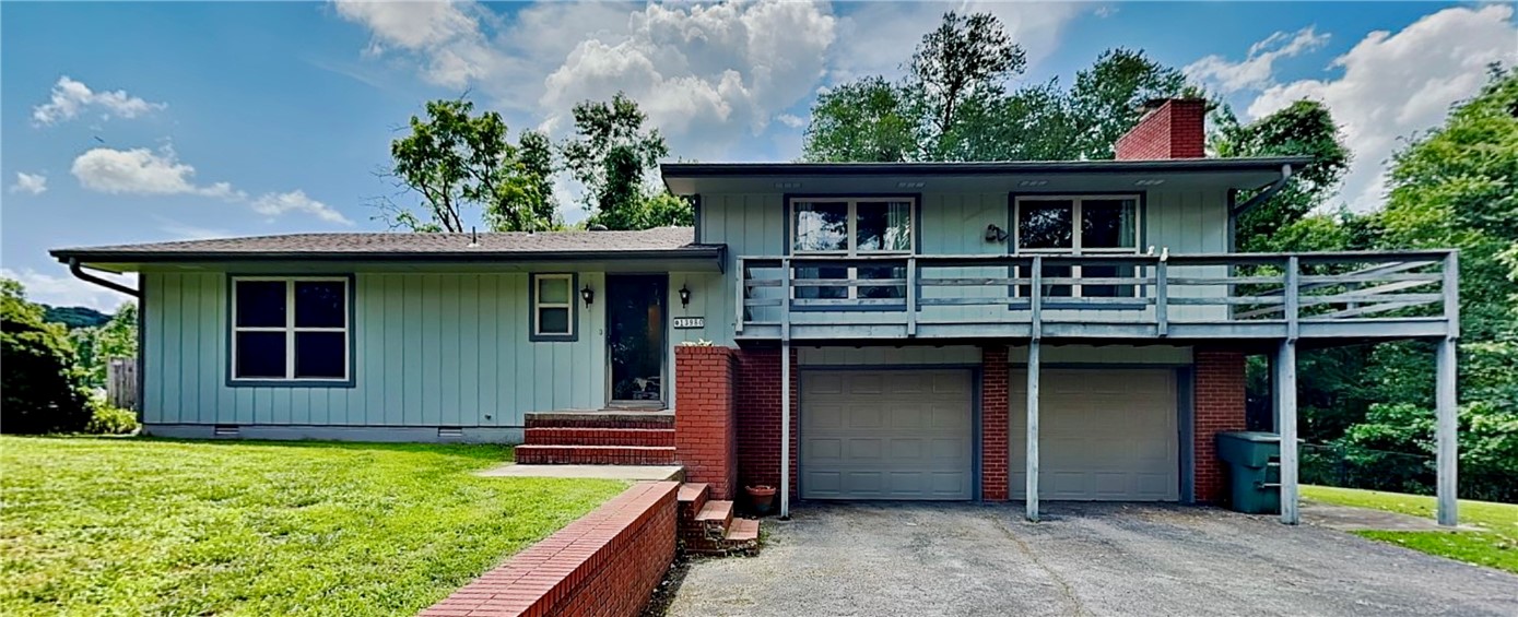 Peaceful, quiet, and super affordable. Nestled in the SE corner of Siloam Springs in Northwest Arkansas makes this gem a quick and easy commute. Sitting 10 minutes to JBU, 25 minutes to XNA, and 45 minutes to the new home office or downtown Bentonville- this location is prime! This charming home offers a serene escape. Enjoy the expansive wrap-around deck, perfect for morning coffee or evening stargazing. With no neighbors on one side, you'll appreciate enhanced privacy and tranquility. The property features an oversized garage, providing ample space for vehicles, storage, or a workshop. Inside, find a comfortable layout with plenty of natural light. This home offers the best of both worlds: a peaceful retreat with convenient access to major amenities and employment hubs in NWA. Don't miss this opportunity for affordable living in a highly sought-after area. View the virtual tour now and then schedule your showing today to experience the charm and convenience this Siloam Springs home has to offer in person!