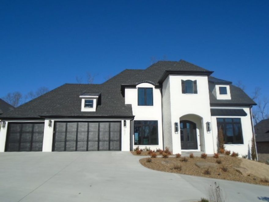 GORGEOUS DAVID HARRIS NEW CONSTRUCTION with fabulous amenities throughout!  3,612 sq feet featuring 4 bedrooms and 4 full baths!  3 car garage with fully fenced yard featuring iron gate fence.  Bonus/game room, wet bar, open concept floor plan, formal dining, luxurious master retreat, gourmet kitchen and so much more!