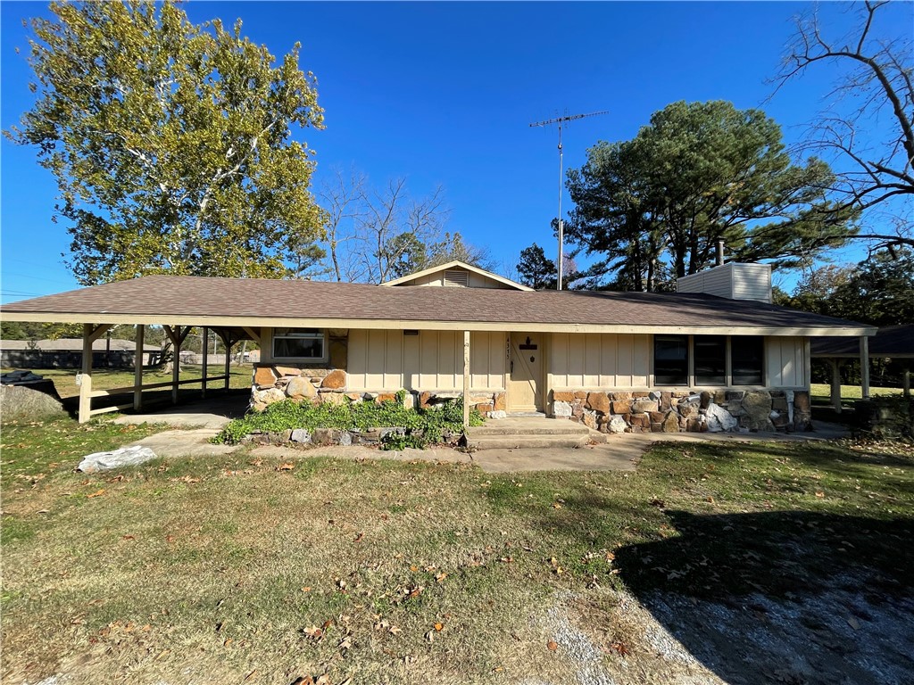 1,780+/- Sq Ft 3 bed 2 bath home in a convenient location to 71B and I49. This home features a large master bedroom with 2 closets, huge living room with wood burning fireplace, and a large level yard with mature trees.