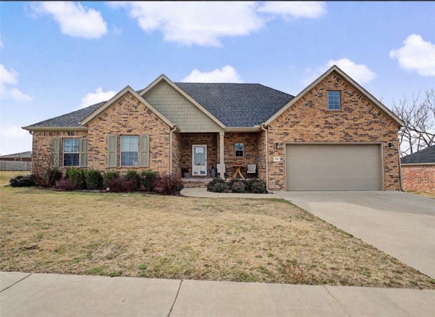 Picture with garage door is AI Pic showing that the Seller is willing to convert back to a garage (with a deposit), and has the original garage door and tracks/opener which may vary from picture. Offering $7,500 in concessions to the buyer! Try to find a newer 4 bedroom 3 bathroom home in Siloam Springs for this price! Built in 2021, this well-built home has an amazing bonus room and no neighbors in the back (pasture). Quality finishes throughout, and it's clear that the garage enclosure 2nd living room was done very well - it feels like the rest of the home! Vaulted ceilings, gas log fireplace, crown molding, accent walls, attic storage, walk-in closets, granite counters, & double sinks in two bathrooms. Electric range but plumbed for gas as well. 2 minutes (1.4 miles) from City Lake Park where you can mountain bike, fish, play frisbee golf, or walk around the Lake/Creek! Amazing value per square foot and convenient location! New roof June 2025. In a market that doesn't provide much affordability - this home does!