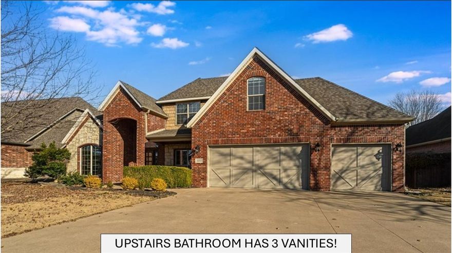 Located in highly desirable Lochmoor Club, this meticulously cared for brick & stone 4-bed, 2.5-bath, split floor plan home comes with a spacious 4-CAR GARAGE! The large kitchen features granite counter tops, stainless steel appliances, pantry & eat-in dining space. Main floor primary ensuite features a tray ceiling, dual vanities, jetted tub & walk-in closet. Three bedrooms & full bath with THREE vanities are upstairs along with a bonus room. Beautiful solid wood floors flow throughout the house. Off the entrance is a dedicated office with French doors for privacy. Dining room is flexible & can be used as a second living room.  Level fenced backyard offers outdoor space & privacy. Interior painted & new zoned HVAC system (2025) & new roof, oven, dishwasher & microwave (2023). Subdivision amenities: pool, club house, playground, tennis, basketball, volleyball & pickleball coming soon. Close to Bentonville Community Center, Central Park Elementary, Bright Field Middle & Fulbright Jr High. 5 miles to Walmart campus.