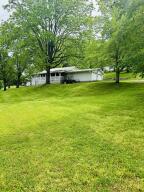 Two bedroom one bath home on more than one acre close to town but out of city limits. Large two car garage. This one wont last long!