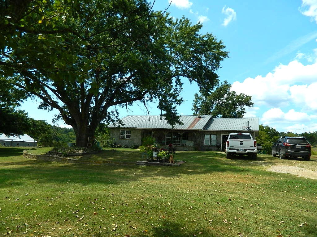 Come Home to Dry Fork Creek ā Beautiful Country Living on 123 Acres! Welcome to your dream homestead along the serene, year-round spring-fed Dry Fork Creek. This stunning 123-Acre property offers peaceful privacy just minutes from Hwy 412 ā the perfect mix of seclusion and convenience.
With 90% pasture, the land is ideal for livestock or hay, producing approx. 220 round bales per cutting. The adorable farmhouse is cute as a button, with cozy living spaces, and charm throughout. Two water wells, both of which have never been dry, ensure reliable water. Features include: Two 43x500 poultry houses (active until 2025); Two barns, a shop, and a working cattle pen; Fertile pastures and natural beauty throughout; A clear swimming hole on the spring-fed creek for relaxing or play.
If you're seeking productive land, privacy, and rural beauty ā Dry Fork Creek is calling you home! Agent Related to Seller - Also, see MLS# 1318153