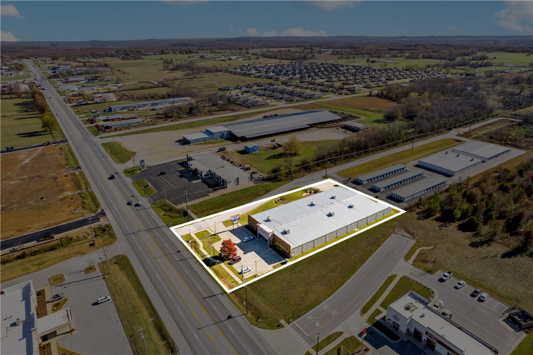 MUSIC GROUPS ADD-SILOAM SPRINGS - Commercial Lease