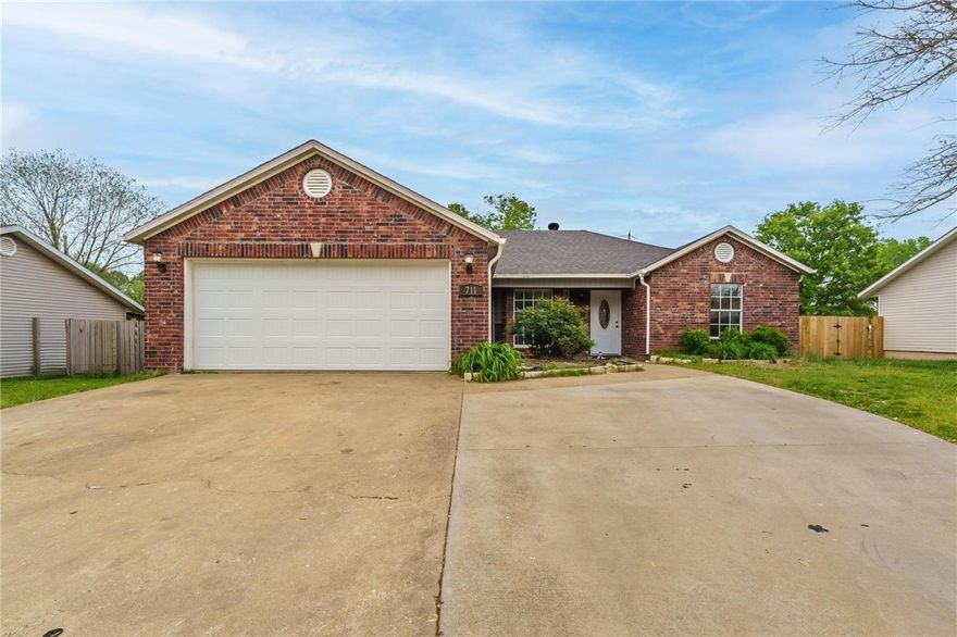 Newly remodeled home inside and out. Exterior was replaced with brick; additional parking has been added to the driveway along with an additional 225 sq ft office/bonus room. Kitchen counters are quartz and all flooring has been replaced. Move in ready split floor plan with a newly added covered patio in the spacious backyard. Location is key in NWA and being right off of 71-B, I-49 shopping restaurants and schools you cannot beat this home!