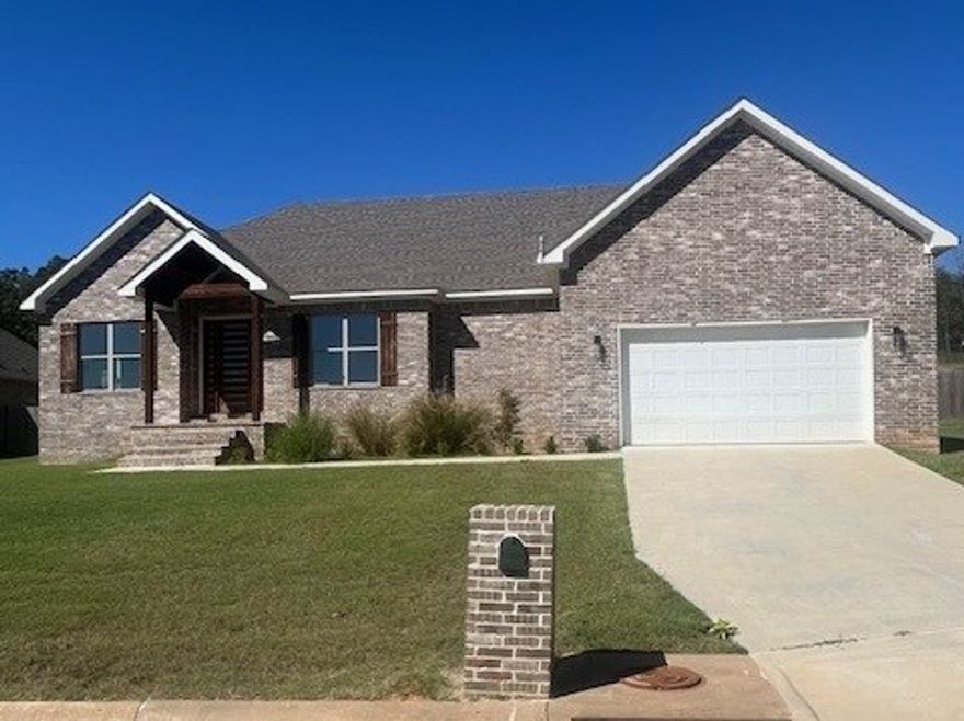 Beautiful, newly constructed, ranch style home with lots of natural light & modern front entry!   Home features a spacious kitchen/living area with a large pantry.  The open design living area features a beautiful brick floor to ceiling fireplace & wood beams. The spectacular private Master ensuite features double vanities in the master bath along with a tub & walk-in shower & a huge walk-in closet.  Jack Nolen Lake Nearby!  Must see to appreciate!