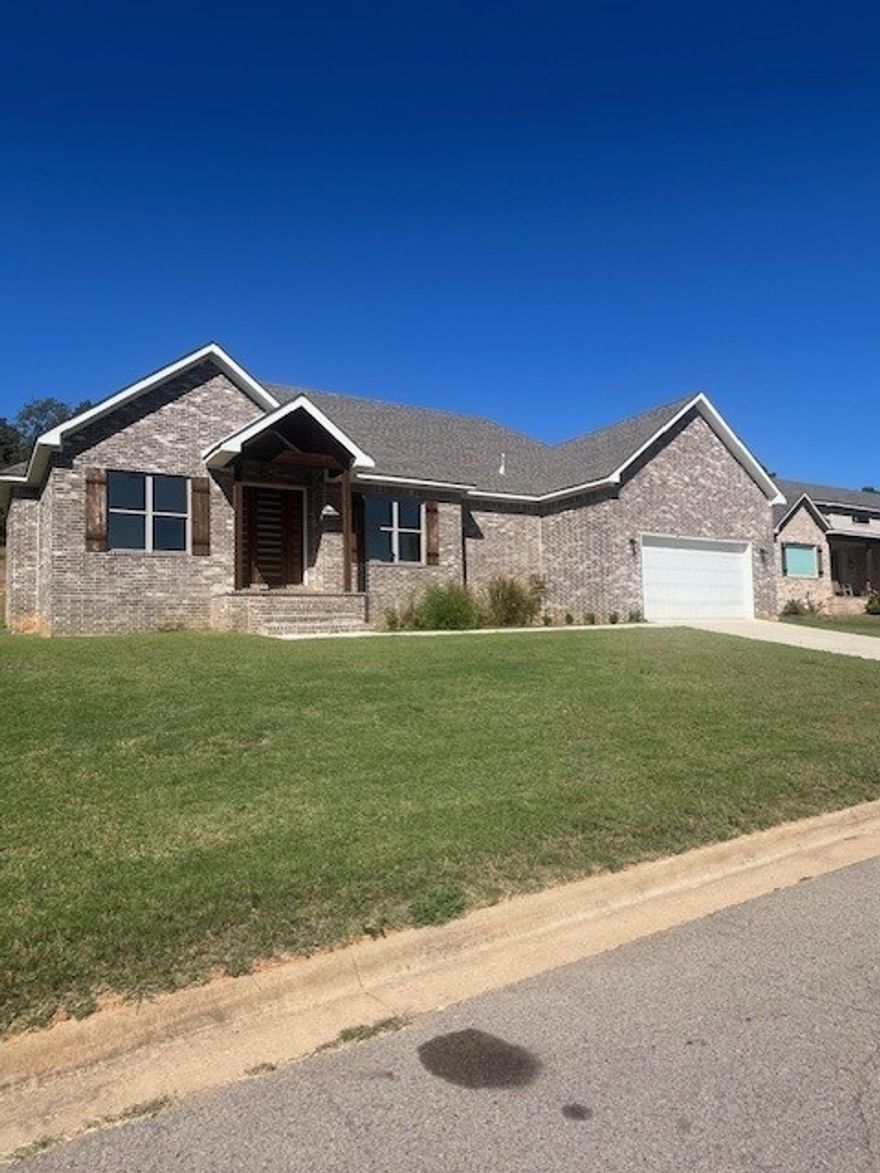Beautiful, newly constructed, ranch style home with lots of natural light & modern front entry!   Home features a spacious kitchen/living area with a large pantry.  The open design living area features a beautiful brick floor to ceiling fireplace & wood beams. The spectacular private Master ensuite features double vanities in the master bath along with a tub & walk-in shower & a huge walk-in closet.  Jack Nolen Lake Nearby!  Must see to appreciate!