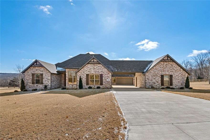 Custom home that has it all. Situated on a 1.85 acre flat lot in highly sought after Fayetteville schools (Vandergriff). This home has 4 bedrooms, 4 bathrooms, a gourmet kitchen with professional grade appliances, a large office (or second dining), a huge master suite, a large upstairs bonus room, an amazing outdoor living space and 5 total garage spaces. Custom features include..custom wood flooring, custom built cabinets, beautiful wood beams, a whole home Generac generator system and so much more.