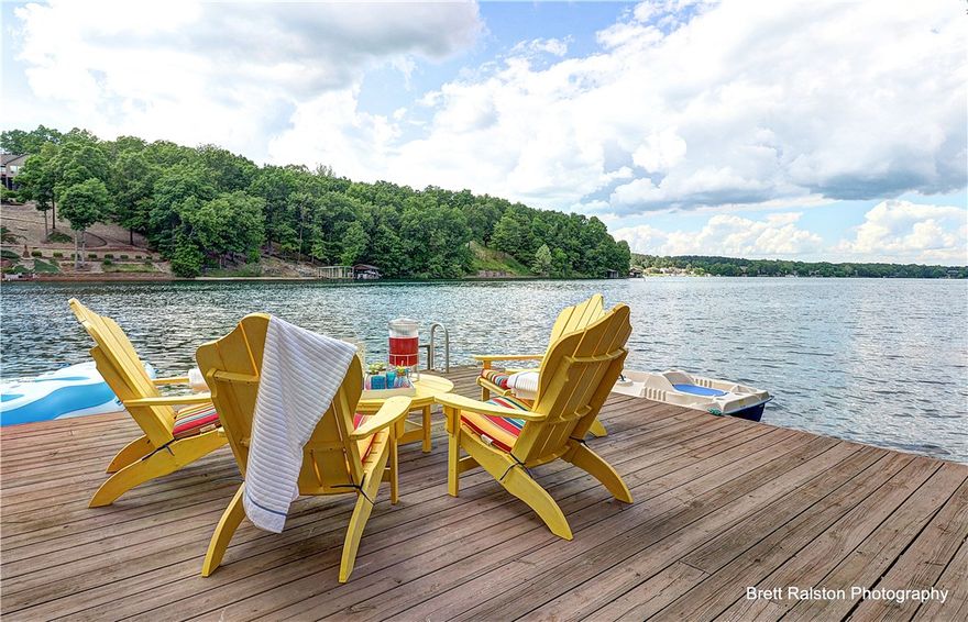 LUXURY LAKEFRONT LIVING at it's FINEST! Relax in the comfort, beauty & elegance of this one-owner custom home on Loch Lomond. Every detail, inside & out, adds to the fun & joy of lake life. Three wrap around lakeview decks, chef's kitchen with adjacent hearth room, covered boat slip, family/theater area with kitchenette, a huge workshop, & an elegant master suite with fireplace, morning coffee bar, it's own private deck and a workout room. This home truly has it all. It's the perfect place to unwind & share laughter with family, loved ones and friends. Space for everyWAY living. 8.5 miles from Walmart Headquarters 3 miles from new Bella Vista bypass Make an appointment to see this luxurious home & experience all it has to offer for yourself. Loch Lomond is a beautiful, privately owned lake. It is therefore NOT under the jurisdiction of the U.S. Army Corp of Engineers.