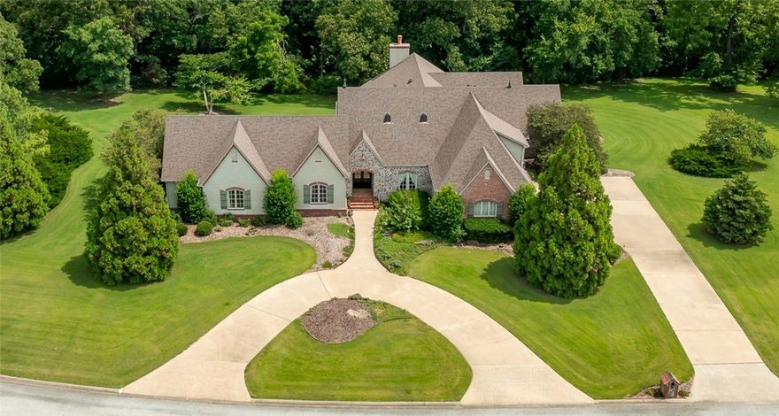 Rare One Story European Estate serenely nestled in prestigious Talamore on nearly flat 3+ acres. Impressive craftmanship w/ hardwood & saltillo tile floors, woodcase windows, 6in basebrds, substantial crown, & Inter-lock doors throughout. Impressive Sanctuary Primary Suite w/attached Bonus Rm. Primary Bath features his/hers granite vanities, jetted tub, spa steam shower, water closet, access handbars, heated trav. flrs, walkin closet w/storage. Separate Wing: 3 BdRms w/2 full baths & Thtr/Media Rm(5thBR). Upstairs Office Rm(6thBR). Formal Dining Rm w/built-in wine cabinetry. Heart of this Home is the Gorgeous Gourmet Island Kitchen w/Subzero-Dacor-Wolf, furniture grade cabinetry w/granite. Open flrplan entertaining in Great Hearth Rm. Breakfast Rm leads to Patio. 3-Car Garage conveys workbench & mobility ramp. $5,000credit for new garage doors. Lawn/Landscape well water sprinkler system. New Roof July 2024! Home Warranty included! This remarkable estate provides a backdrop for grand lifestyle living; Welcome Home!