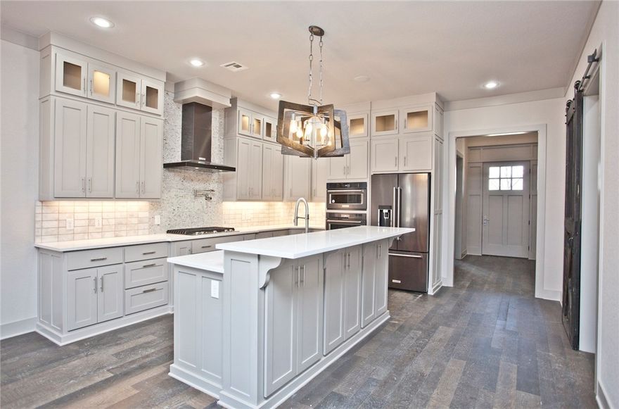 Payne Construction masterpiece with open floor plan in sought after area. Awesome location in the heart of the fast growing Downtown Bentonville! Enjoy being minutes from all the fun and excitement Bentonville has to offer. Close to Walmart Home office. The square, shops, schools, and restaurants are all in your backyard! Enjoy the ultimate living room with gas fireplace, tons of natural light and exposed wood beams. Kitchen features large island, double ovens, walk in pantry, custom cabinets, and central vacc! Secondary bedroom on main level can be 4th bedroom or study. Upstairs has three large bedrooms and a bonus room that is pre-wired for sound.