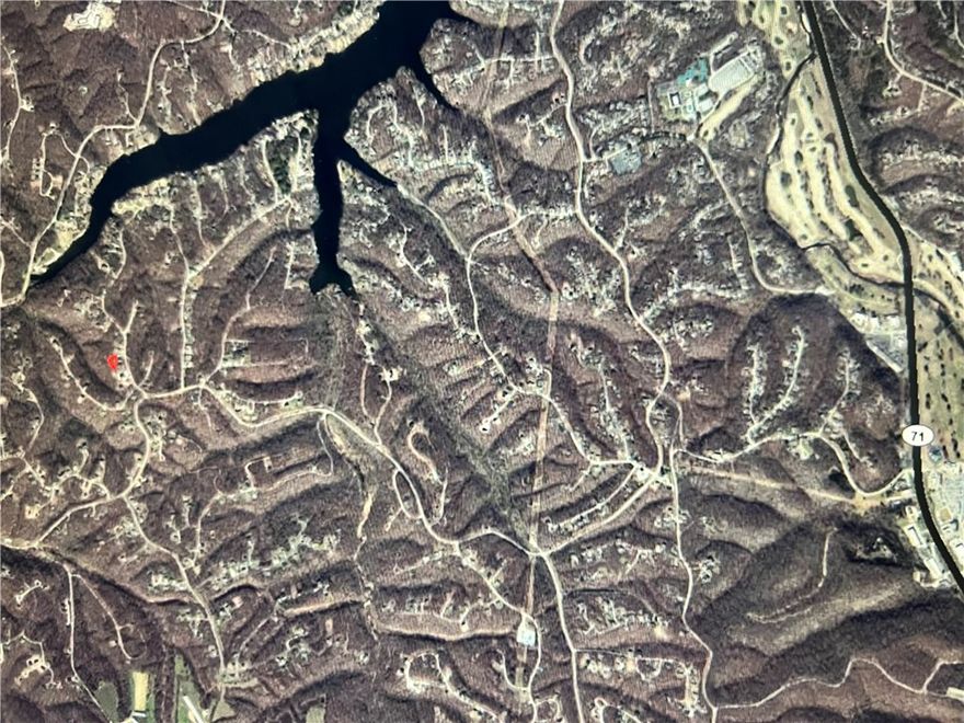 Buildable Lake and Trail Lot!  ~600 ft from Wake-Friendly Lake Windsor and ~600 ft from Tunnel Vision Trail near the Up Hills Both Ways intersection!!  Beautiful lot off of Pimlico Drive, right off of Chelsea Road And in Bentonville School District!   Tweety Bird, Little Sugar, LandLine, Tavistock Canyon, etc and Kingsland Golf Complex and Much more with in 1.5 miles.  Access,  Opportunity, AND Location with this lot!  Bella Vista is a fast growing community exclusively focused on Outdoor Resort & Recreation Living.  This lot is in the Southwest Corridor of Bella Vista, as is the newly Oz Trail Park!  If you know, you know...