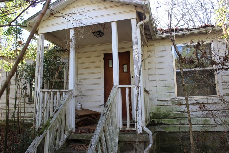 Are you looking for a project? Pretty sure this one might be a tear-down. Have a look around, but do not enter house. If you do, you do so at your own risk. Property has not been occupied in years.