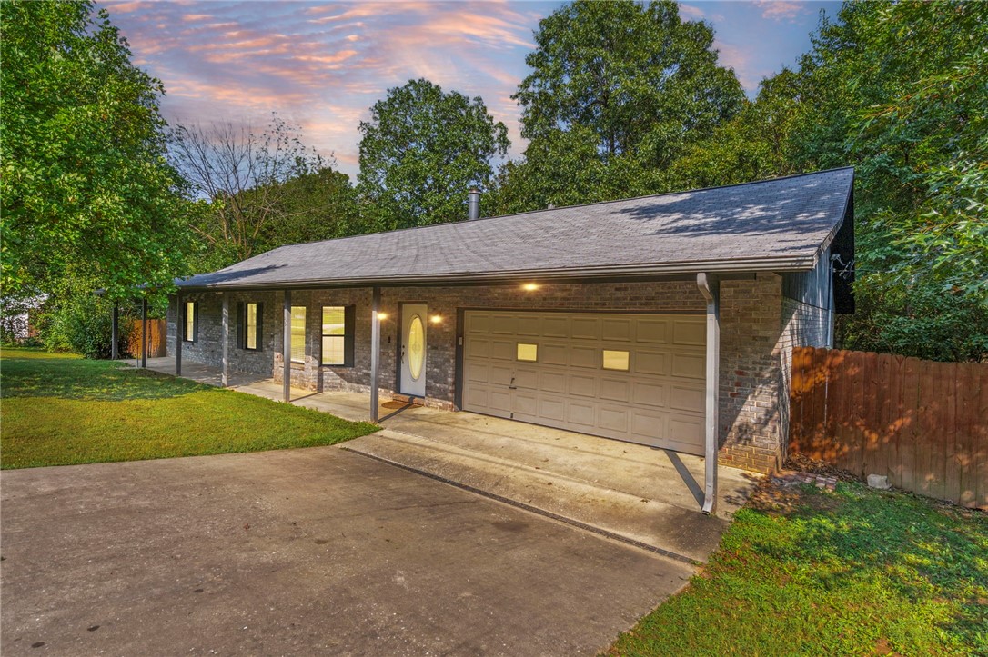 Freshly updated 3BR/2BA in Callihan Estates on 1.24± ac. Open plan with LVP flooring and brick wood-burning fireplace. Kitchen plumbed for gas & electric; washer, dryer, fridge & freezer convey. Enjoy the expansive deck, in-ground pool (plumbing updated & liner re-installed Aug 2025), and a wooded backdrop with frequent deer & wildlife sightings. Fenced yard plus workshop with lean-to. Sellers are ready for new owners—don’t miss this one! Easy access to Hwy 112 & I-49.