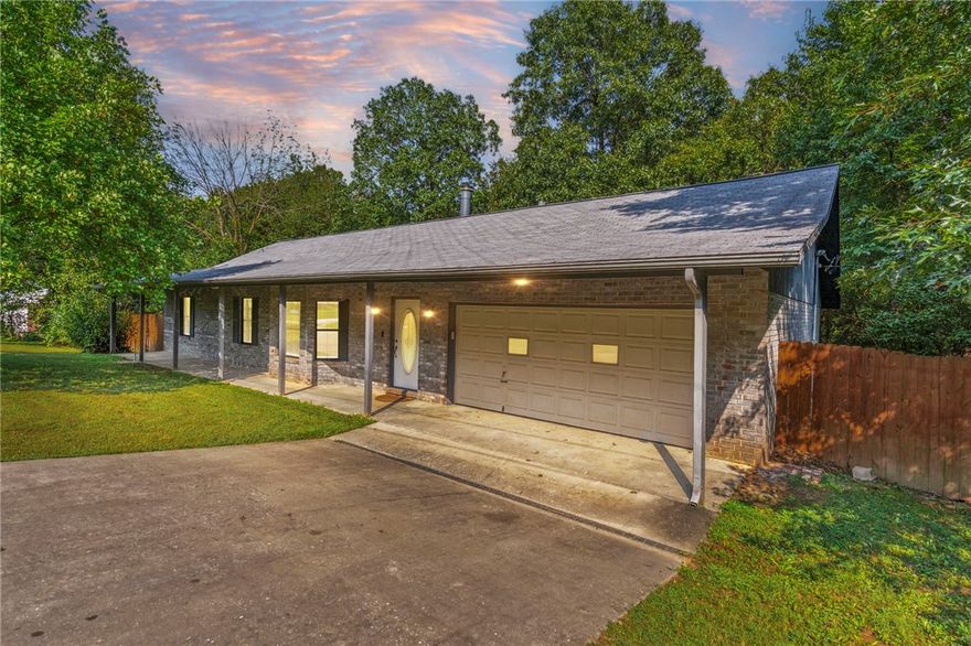 Freshly updated 3BR/2BA in Callihan Estates on 1.24± ac. Open plan with LVP flooring and brick wood-burning fireplace. Kitchen plumbed for gas & electric; washer, dryer, fridge & freezer convey. Enjoy the expansive deck, in-ground pool (plumbing updated & liner re-installed Aug 2025), and a wooded backdrop with frequent deer & wildlife sightings. Fenced yard plus workshop with lean-to. Sellers are ready for new owners—don’t miss this one! Easy access to Hwy 112 & I-49.