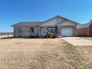 This three bedroom two bath home sits on a beautiful .66 acre lot just on the outskirts of Russellville. Enjoy gorgeous mountain views and incredible sunrises and sunsets! With a new roof and newer HVAC system, it would only take a small amount of cosmetic updating to transform this home into a showpiece! Master suite features a walk-in closet, and the main living area is open to the kitchen and dining space to provide an open concept that is perfect for entertaining large gatherings of friends and family. Fully fenced backyard for pets or children and space outside of the fence that would be a great area for gardening. Dont miss this one!!