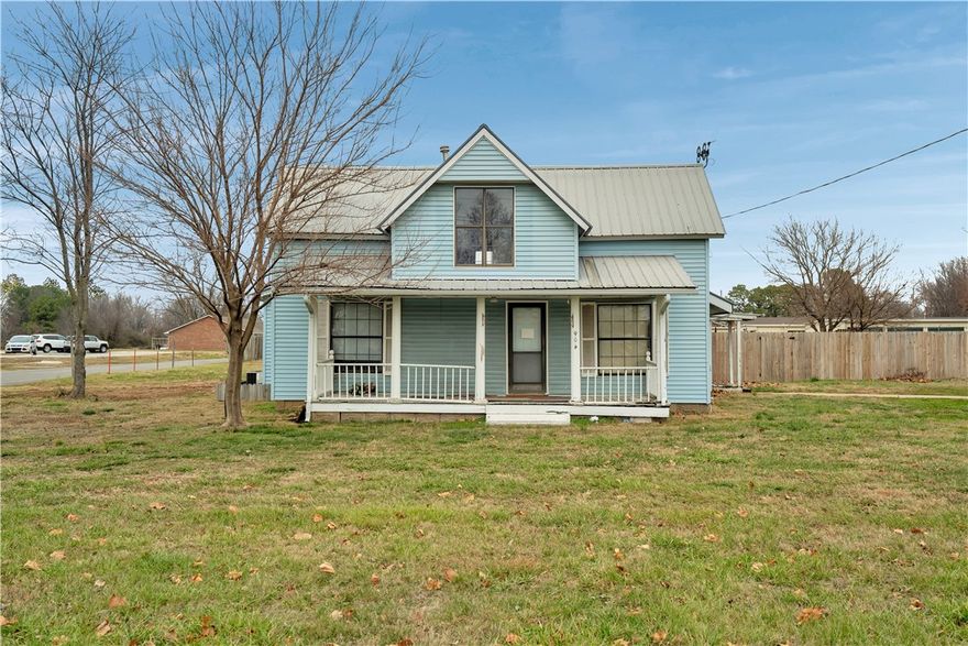 OPPORTUNITY! Come see your next investment property on nearly an acre and commercially zoned right off of Main St in the ever-growing Gentry, Arkansas! Give this home a bit of TLC or use commercially, the choice is yours! Complete with a downstairs master, separate laundry, fenced backyard and flex-space upstairs and downstairs! Don't wait, schedule a showing today!