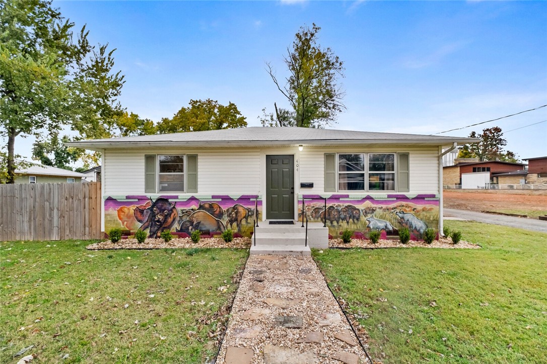 Updated bungalow, offering the perfect blend of charm, comfort, and location. Just blocks from the Bentonville Square, this home puts you at the center of Northwest Arkansas most vibrant scene. Close to the Razorback Greenway, MTB trails, downtown restaurants, shopping, and Crystal Bridges Museum.