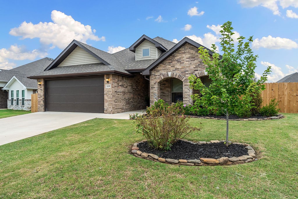 Better than new! Charming home in the growing community of Pea Ridge! Located in the Avalon subdivision—the closest Pea Ridge neighborhood to Bentonville—you’re just 8 miles from Walmart HQ and the Bentonville Square. More interested in downtown Rogers or the bike trails of Bella Vista? This location has you covered because Pea Ridge is in the middle of all that NWA has to offer.
This well-maintained home features an open, inviting layout with a spacious kitchen island, cozy corner fireplace, and dining area that form a cozy and convenient core of the home. The primary suite offers a large bedroom, dual-vanity bath, soaking tub, and separate shower. Outside, enjoy a fenced backyard and a 2-car garage for added convenience. Upgrades include: wood look tile, additional insulation, fence, plumbed for gas, natural stone landscaping, lighting, accent walls, and more.
Don’t miss out! Ask for the virtual 3D tour or schedule your private showing today.