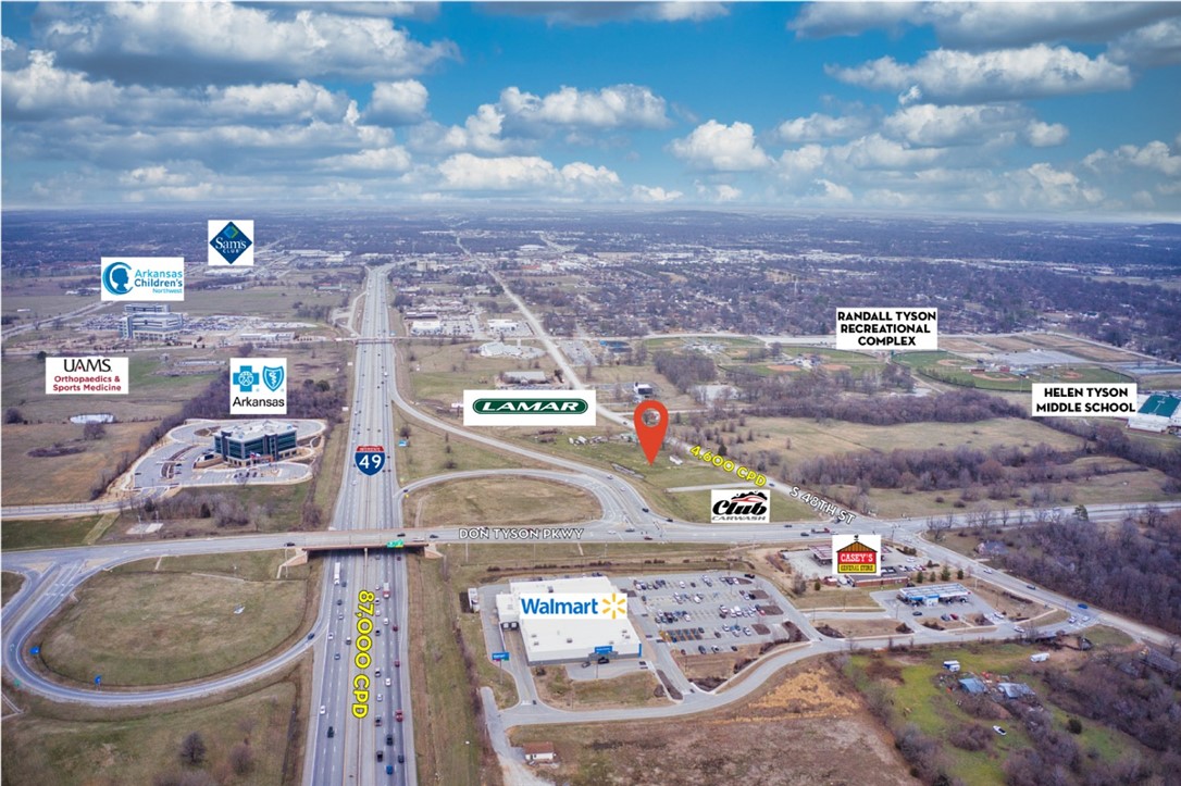 Prime development opportunity in a rapidly growing area. Acreage is centrally located in the new Springdale Care Corridor. Property is surrounded by many large scale developments taking place along I-49 & Don Tyson Pkwy. 2.79 acres remaining, 1 acre under contract. Club Carwash coming to adjoining property to the south. Lamar Advertising recently constructed to the north. Near Walmart Neighborhood Market & Casey's General Store. High traffic area with visibility from I-49. Flat, clear property with all utilities at site.
