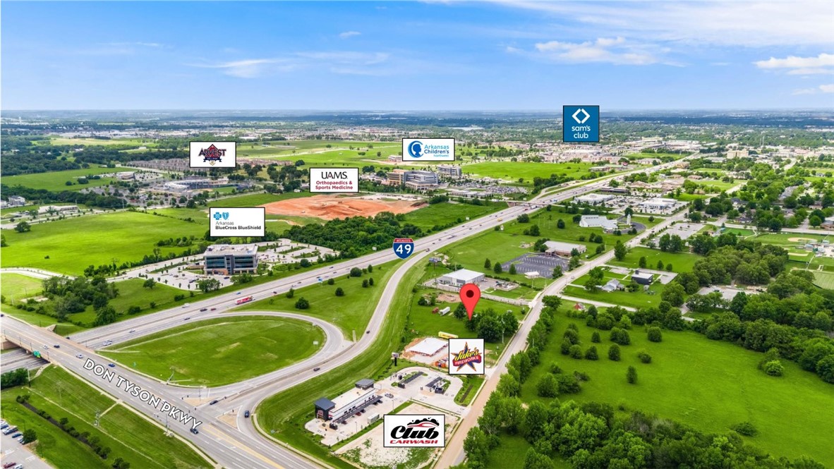 Exceptional development opportunity! This prime 2.79 acre lot is positioned between I-49 and S 48th St at the Don Tyson Pkwy exit. Located in the heart of the Springdale Care Corridor, and surrounded by various new retail, office, medical, and mixed-use developments. Anchored by Lamar Advertising, Club Carwash, & Jake's Fireworks - Level lot with all utilities on site - Near Walmart Neighborhood Market and Casey's General Store - High traffic visibility with 103,000 cars per day along I-49
In close proximity to Children's Northwest Hospital, Blue Cross & Blue Shield, Highland Oncology, UAMS, & Arvest Ballpark.