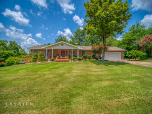 When arriving at this home, the alluring front porch simply draws you in! This Home has 2 grand suite ensembles,(one on main floor & one in the basement) This 3 BR/3BA home has a formal dining, breakfast nook, and so much more! Wood fireplace in den upstairs and downstairs! Enjoy your Inspiring downstairs Work shop year round. Need storage? this home has it! Once outside, you will APPRECIATE the manicured lawn and thoughtfully planted landscaping that provides privacy and beauty. From the back deck to the quaint courtyard this is one unique home!