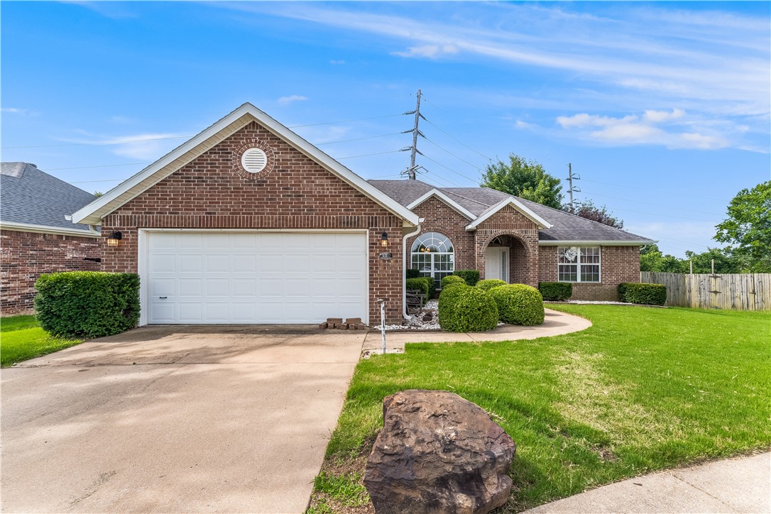 Welcome to this charming brick home nestled in a prime Springdale/Johnson locationājust one mile from I-49 and moments from Johnson Mill, trendy shops, and local favorites. You'll love the peaceful view of the Fayetteville Hills from your own backyard, complete with a fenced-in space for added privacy and comfort.
Inside, the open layout blends a cozy living area and formal dining space, anchored by a bright white gas log fireplace. The kitchen features a darling bay window in the breakfast nook and a mix of ceiling styles that add personality throughout the home.
The split-bedroom floor plan offers privacy and functionality, with the spacious primary suite showcasing twin corner windows, a large walk-in closet, dual vanity, a whirlpool tub, and separate shower.
Whether you're looking for a full-time residence, a Northwest Arkansas retreat, or a smart rental investmentāthis home is full of charm and potential. Come see it for yourself!