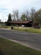 Perfect property for any stage of home ownership or Investors Close to the college & town. House has been well taken care of & well maintained and has new paint. Property goes from street to street (borders Hwy 103, Kraus & Jackson). Front & back yard are fenced with storage building & storm cellar. Lot next to the home is a part of the property not fenced.