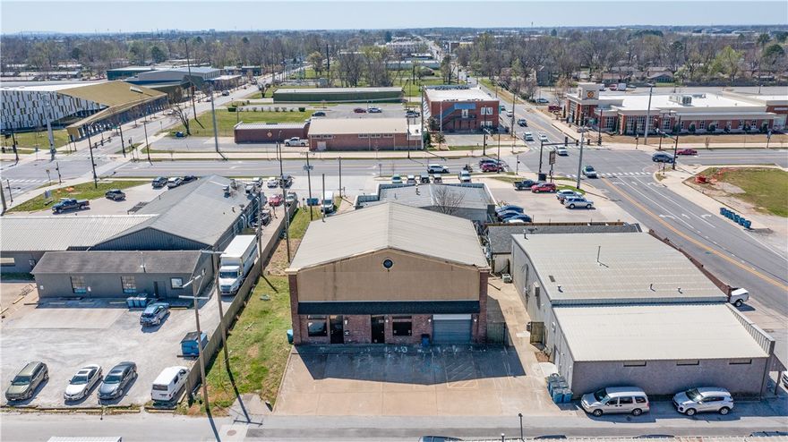 Office space features a reception area, three private offices, a restroom, and a convenient kitchenette.  Functional first-floor warehouse space with a roll-up drive-in door and extensive second-floor storage with high ceilings. This property offers an outstanding downtown Bentonville location just minutes from the Bentonville square, situated in the vibrant Arts District and benefiting from strong foot traffic and convenient access to surrounding amenities. Conveniently located within walking distance of 8th Street Market and an array of nearby retailers and restaurants. Prime location just minutes from the Walmart corporate campus, offering strong synergy with Northwest Arkansas’ largest employment hub.