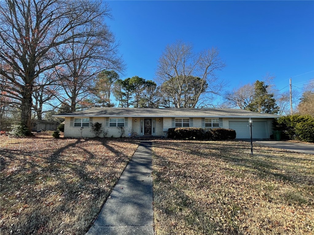Charming home in great location in Rogers. 2316 SQFT 3BD/2BA. Large spacious rooms and extra large master bedroom. Two dining and two living areas. In-ground pool, spacious lot with mature trees. Easy access to parks, trails, schools, shopping, library, and Downtown Rogers. Well maintained and lots to be desired.
