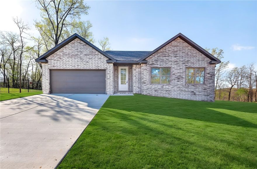 Beautiful new construction home situated on a desirable corner lot in Bella Vista! This full brick exterior home offers durability and curb appeal, located just minutes from Metfield Golf Course and the Back 40 bike trails. Featuring 3 bedrooms and 2 bathrooms, this home boasts an open floor plan perfect for modern living. The spacious living area includes a cozy fireplace and abundant natural light. The kitchen is equipped with quartz countertops, ample cabinetry, and a functional layout ideal for entertaining. Enjoy quality finishes throughout and a thoughtfully designed split-bedroom plan. A perfect blend of comfort, style, and prime location!