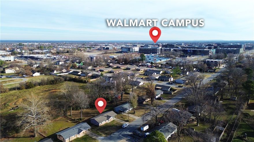 Updated home in downtown Bentonville on a large .24 acre lot! Just blocks from the new Walmart Campus, 8th Street Market, The Momentary, and Thaden School. Recent updates include a new roof, stylish cabinets, LVP flooring, contemporary light fixtures, new siding, windows, sinks, and appliances. Backyard is spacious and adjoins land owned by Thaden School. Schedule your showing today!