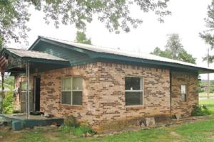 3 bedroom brick home in Lamar. Nice sized corner lot. Laminate flooring and central heat and air. Soldas is. Last time it was listed was listed for $55,000.