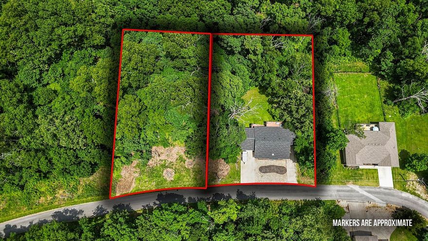 Motivated seller!! Updated & move-in ready! This 2,062 sq ft home is listed with the & .47-acre lot (Lot/Block: 20/2) to the left for a total of .97 acres offering added privacy. With 2 bedrooms on the main floor & a lower-level bonus suite with a full bath, there’s no shortage of space. The walkout basement & back deck open to a serene backyardshaded by a canopy of foliage. The sunroom, just off the living room, offers flexible use as a craft room, home office, or playroom. A 2-car garage & 3rd-car covered carport provide ample parking. Updates include: painted exterior(2025), new roof(2022), HVAC(2022), water heater(2024), painted cabinets(2022), engineered hardwood flooring in living room & sunroom, new appliances & fixtures & a retaining wall by the carport. Conveniently located minutes from Branchwood Park, Loch Lomond & the Highlands & Scottsdale golf courses. Looking for more space? Seller will offer $2000 credit for flooring allowance for basement. (Also listed as MLS #1311301 .47 acre parcel not included)