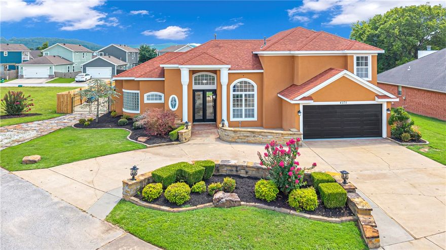 Beautiful 2 level home, one of a kind, Spanish style home, large covered back porch, spacious backyard, tons of upgrades, granite counter tops, updated bathrooms, white kitchen cabinets, wood tile flooring in main areas, wood laminate in bedrooms, fireplace, large windows, whirlpool tub and double vanity in primary bedroom and much more.