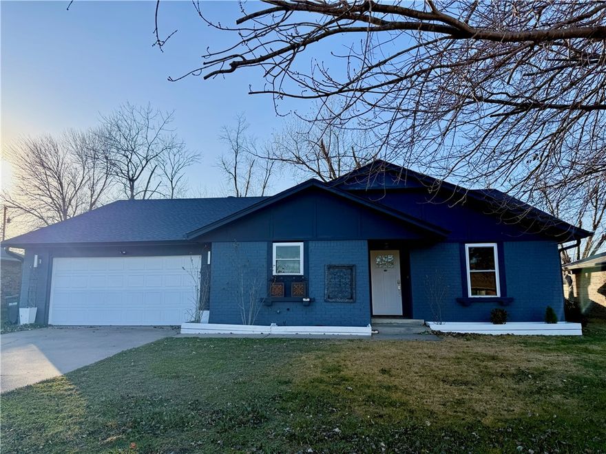 Recently remodeled home in the heart of Rogers! Split floor plan on one level with a huge, fenced backyard! Great for entertaining, the stove faces out so everyone gathered around can see what the chef is cooking! The large living room has a gorgeous gas fireplace and leads out onto the covered patio and outdoor living area. There is a fire pit in the back yard and plenty of wood ready for your first fire. This house is a walk to the Rogers Aquatic Center and just minutes to the Promenade, Walmart AMP and I 49!