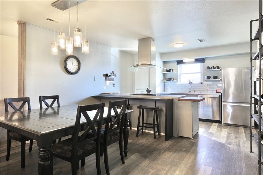 Recently remodeled home in the heart of Rogers! Split floor plan on one level with a huge, fenced backyard! Great for entertaining, the stove faces out so everyone gathered around can see what the chef is cooking! The large living room has a gorgeous gas fireplace and leads out onto the covered patio and outdoor living area. There is a fire pit in the back yard and plenty of wood ready for your first fire. This house is a walk to the Rogers Aquatic Center and just minutes to the Promenade, Walmart AMP and I 49!