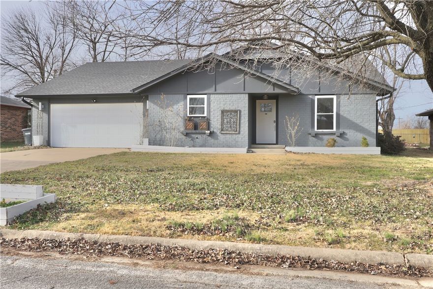 Recently remodeled home in the heart of Rogers! Split floor plan on one level with a huge, fenced backyard! Great for entertaining, the stove faces out so everyone gathered around can see what the chef is cooking! The large living room has a gorgeous gas fireplace and leads out onto the covered patio and outdoor living area. There is a fire pit in the back yard and plenty of wood ready for your first fire. This house is a walk to the Rogers Aquatic Center and just minutes to the Promenade, Walmart AMP and I 49!