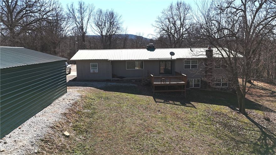 Well-maintained country home on 1.01 acres in the Alpena School District, ideal for a small hobby farm or rural homestead. This 2,026 sq ft home offers 4 bedrooms, 2.5 baths, and a comfortable, functional layout. Built in the early 1990's and kept in good condition, the property includes an additional 560 sq ft basement providing excellent storage or workspace. The level, usable acreage offers space for animals, gardening, or outdoor projects. Outbuilding/shop area adds flexibility for equipment or farm use; cattle equipment in the shop does not convey. Peaceful rural setting just outside Alpena with convenient access to Highway 62 and Harrison.