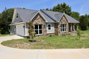 Built in 2020, less than a year old is this Gorgeous 3 Bed 2.5 bath Home in Rockwall Heights subdivision. Located one mile from Lake Ludwig, this home has it all and so much more. Inside features an open concept kitchen and living room complete with a butcher block island and gas fireplace great for entertaining. With lots of windows for natural sunlight and tall tray ceilings, this home creates a large spacious area to enjoy complete with a split floor plan. The master bedroom and bath area feature a double vanity, tile tub/shower, and walk in closet. 2 more bedrooms are coupled with walk in closets and shared bathroom. Also included inside the home is a formal dining room, laundry room, and half bath. Outside features large covered deck, 2 car garage, concrete drive, and private setting.
