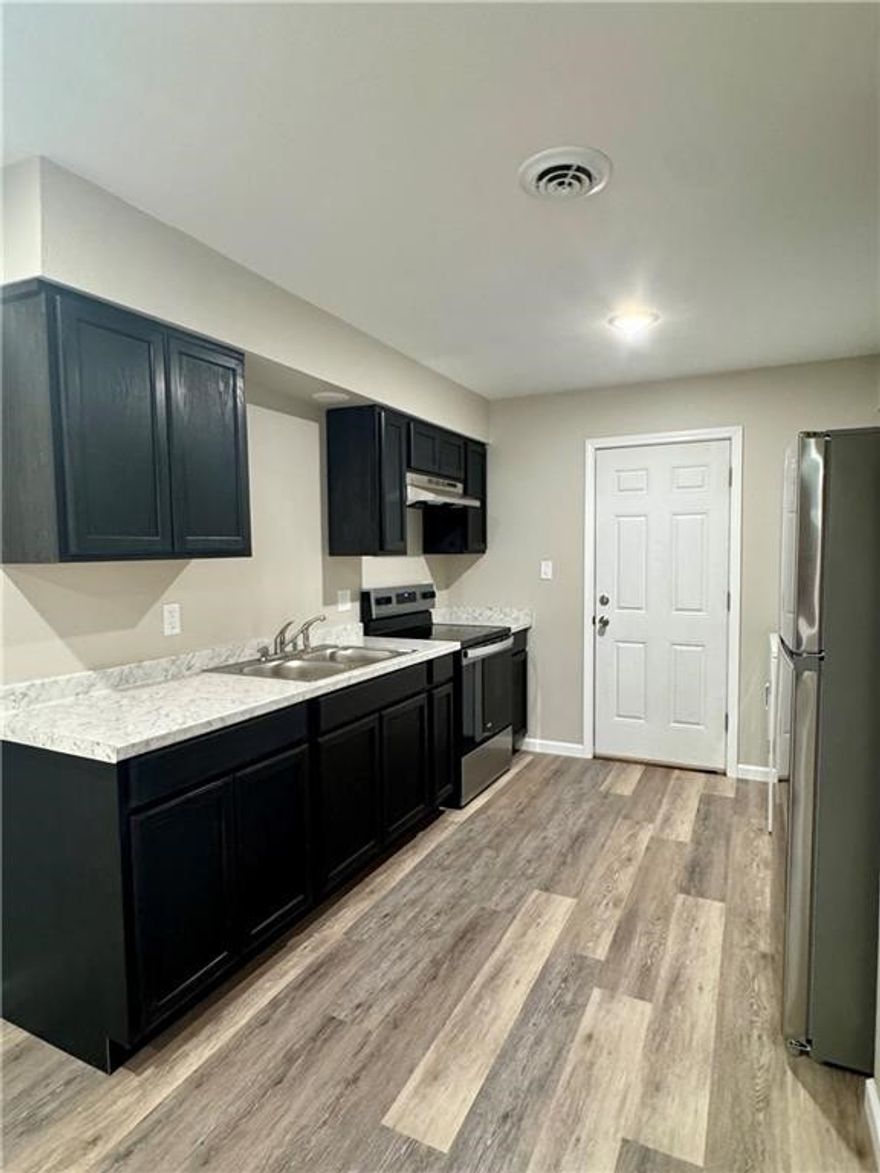 Recently received interior updates in both units!  Each unit is 2 bed, 1 bath with luxury vinyl planks throughout, new cabinets, fixtures, appliances, etc!  The roof was installed this year as well.  All of the appliances convey.  Side B doesn't have a dishwasher nor a garbage disposal.